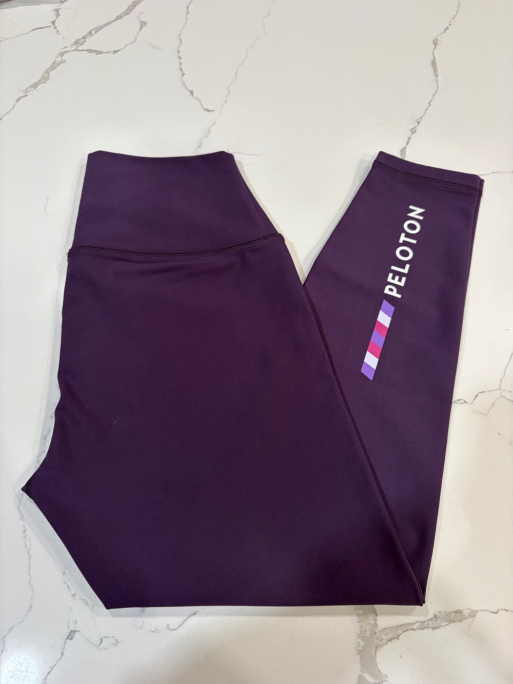 Peloton Deep Purple Cadent Leggings with Multicolored Logo